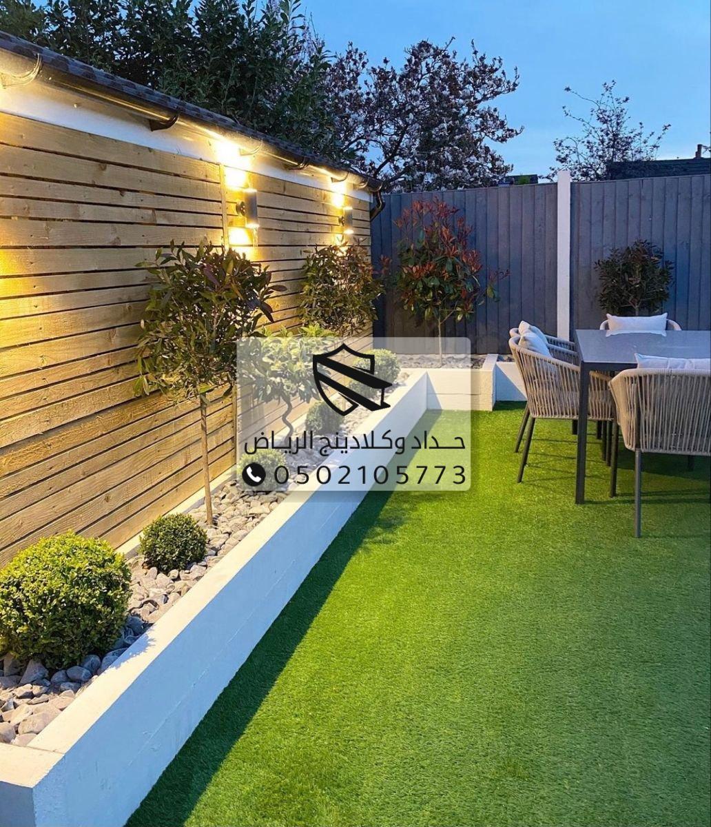 حديقة منزلية مع ديكور خارجي عصريديكورات داخلية وخارجية